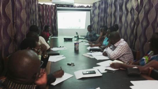Agbenyega in a meeting